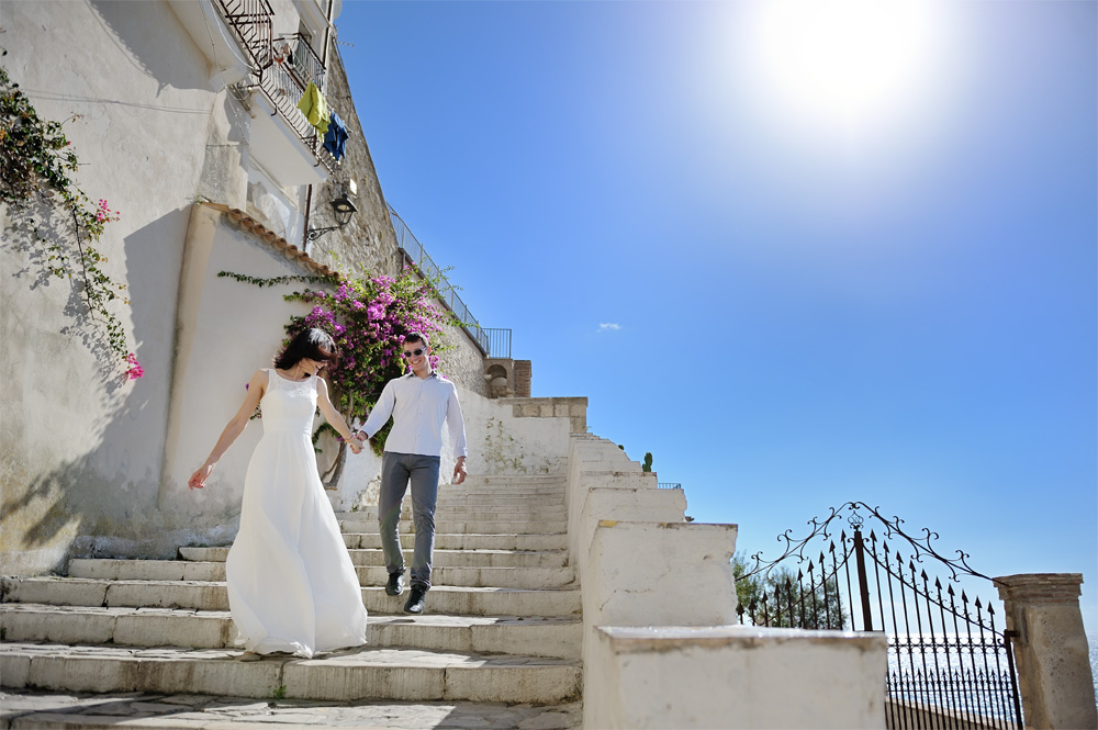 Bride and Groom walking down steps at their wedding in Italy
