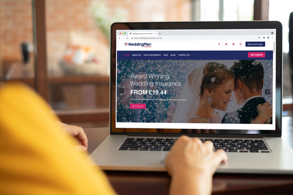 Weddingplan Wedding Insurance website displayed on a laptop.